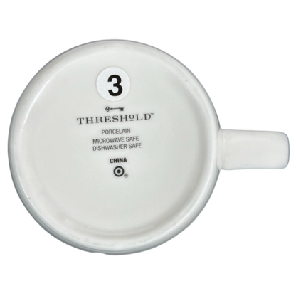 Bottom view of Threshold Sagittarius Astrology Zodiac Mug marked with safety and care instructions