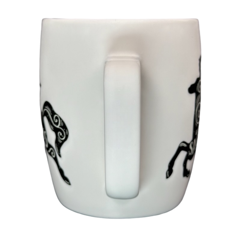 Sagittarius Astrology Zodiac Mug Threshold features black zodiac designs on a white background
