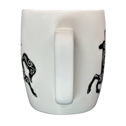 Sagittarius Astrology Zodiac Mug Threshold features black zodiac designs on a white background