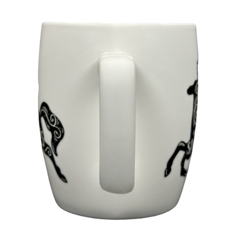 Threshold Sagittarius Astrology Zodiac Mug featuring artistic horse designs on a white background