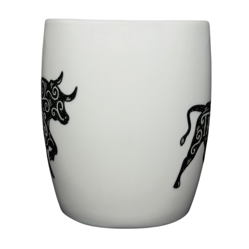 Threshold TAURUS Astrology Zodiac Mug featuring intricate black bull designs on a white background