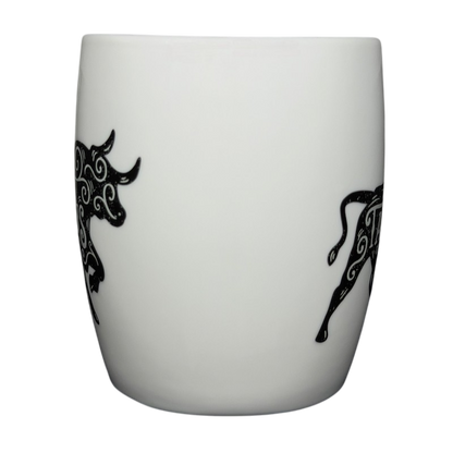 Threshold TAURUS Astrology Zodiac Mug featuring intricate black bull designs on a white background