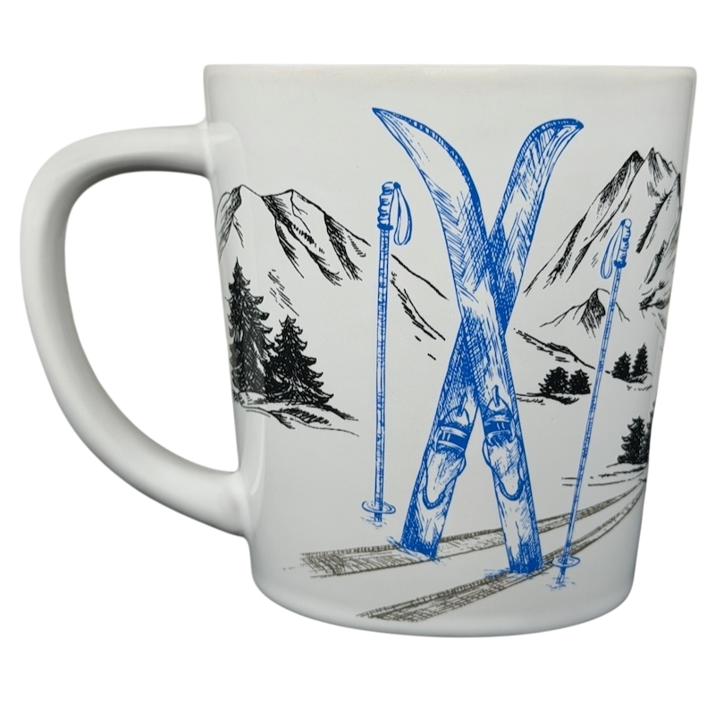 Tim Hortons Winter Ski Scene Mug featuring blue ski equipment against a snowy mountain backdrop