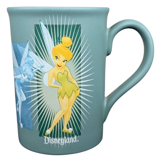 Tinker Bell Disneyland mug featuring colorful artwork of Tinker Bell and vintage design elements
