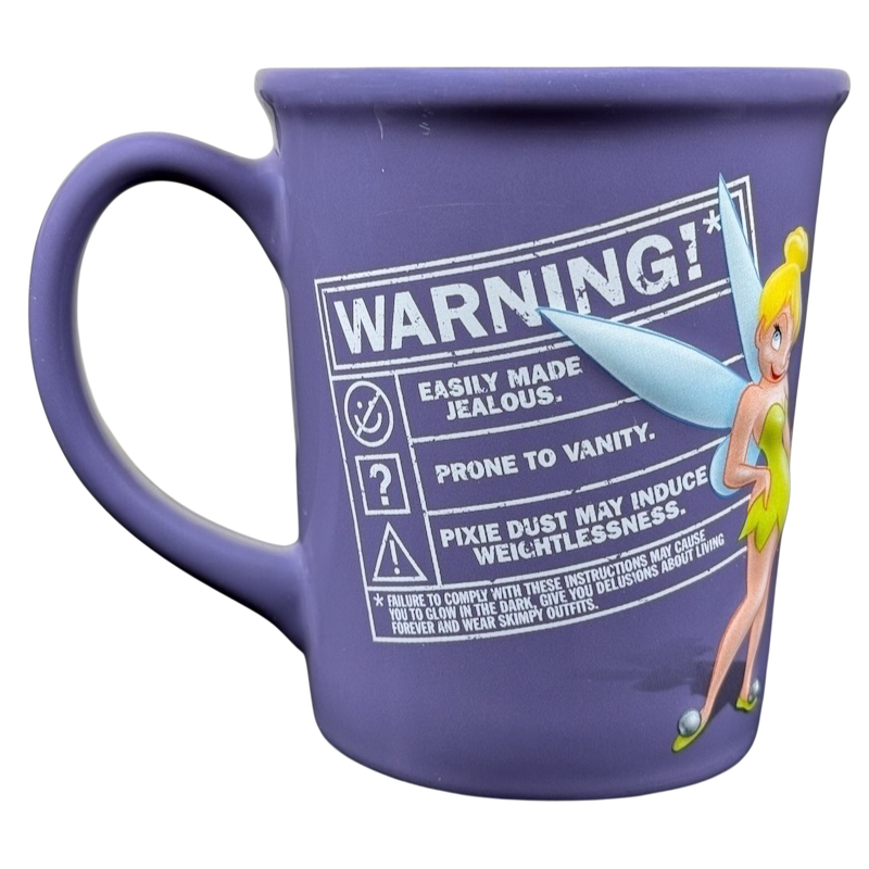 Tinker Bell embossed vintage mug featuring a whimsical design and playful warning details