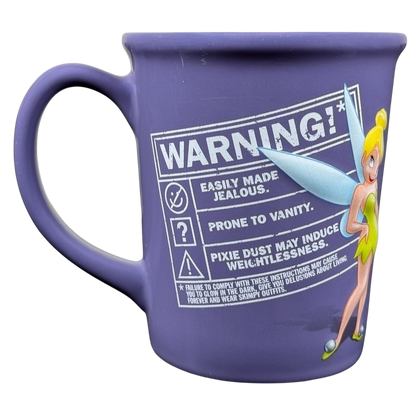 Tinker Bell embossed vintage mug featuring a whimsical design and playful warning details