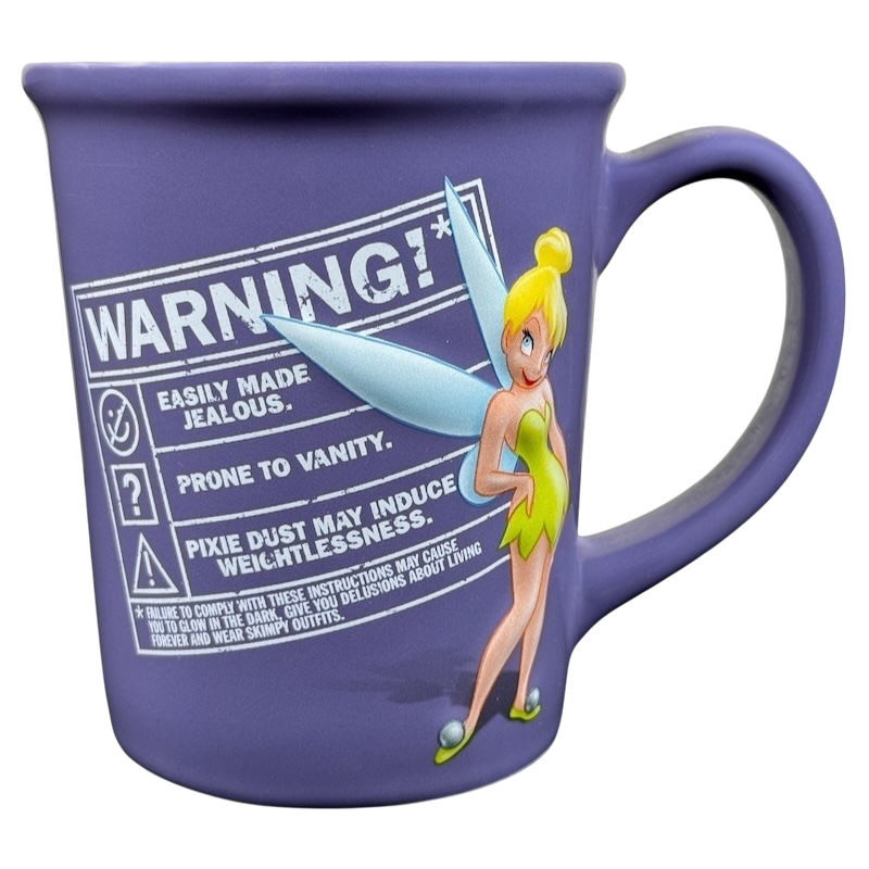 Tinker Bell embossed vintage mug featuring a playful warning label and colorful design