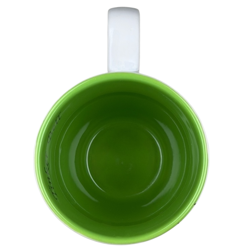 Inside view of a Tinker Bell monogram sparkle collectible mug in vibrant green color