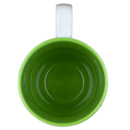 Inside view of a Tinker Bell monogram sparkle collectible mug in vibrant green color