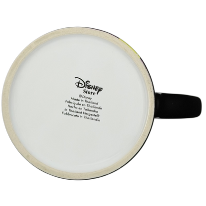Bottom view of a Disney Tinker Bell Pixie Dust mug showcasing the Disney Store logo and manufacturing details