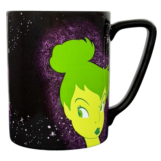 Disney Tinker Bell Pixie Dust mug featuring a vibrant green design against a cosmic background