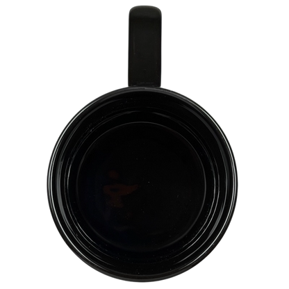 Top view of a black Tinker Bell Pixie Dust mug with a glossy finish for fairy tale fans