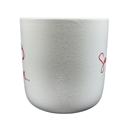 White textured ceramic Sara Bareilles tour mug with red script design ideal for coffee or tea