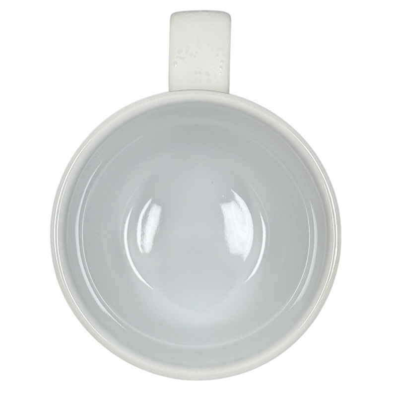 Top view of white ceramic Sara Bareilles tour mug empty glossy interior with handle on black background