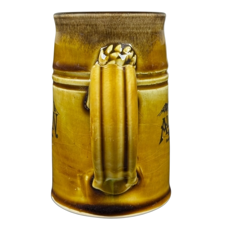 Tom's Pots Alaskan Brewing Co vintage mug with a textured design and sturdy handle for collectors
