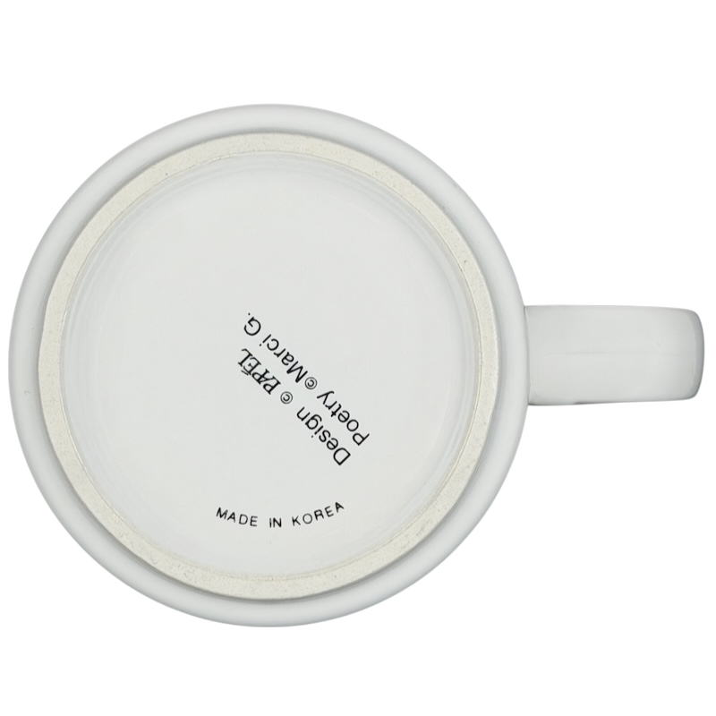 Bottom view of a white TONI name poetry mug by Papel with smooth ceramic finish