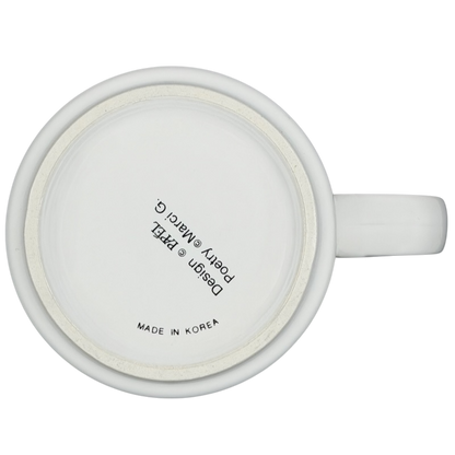 Bottom view of a white TONI name poetry mug by Papel with smooth ceramic finish