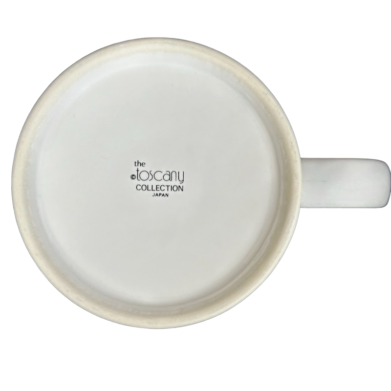 Bottom view of a white Kenneth Grooms computer programming vintage mug showing The Toscany Collection Japan stamp and handle