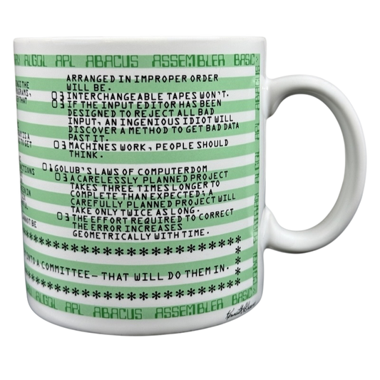 Kenneth Grooms computer programming vintage mug with green code stripes and humorous programming rules text