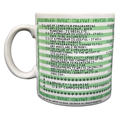 White ceramic mug with green retro code lines and printed laws of programming text Kenneth Grooms computer programming vintage mug