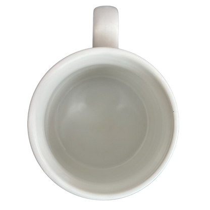 Top view of white ceramic mug with handle empty Kenneth Grooms computer programming vintage mug from The Toscany Collection