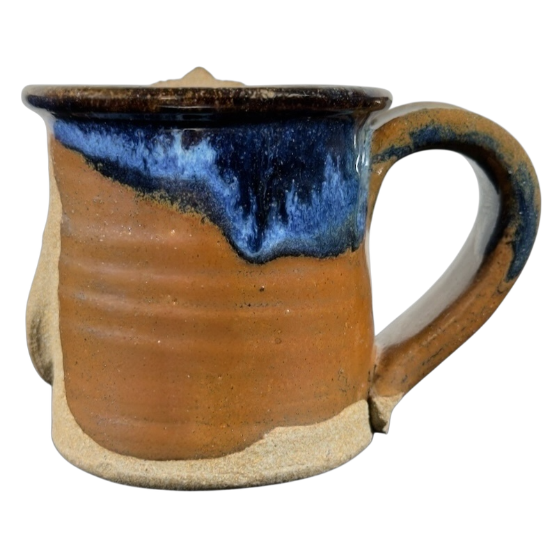 Ugly face pottery vintage winking mug with blue glaze and rustic brown ceramic finish