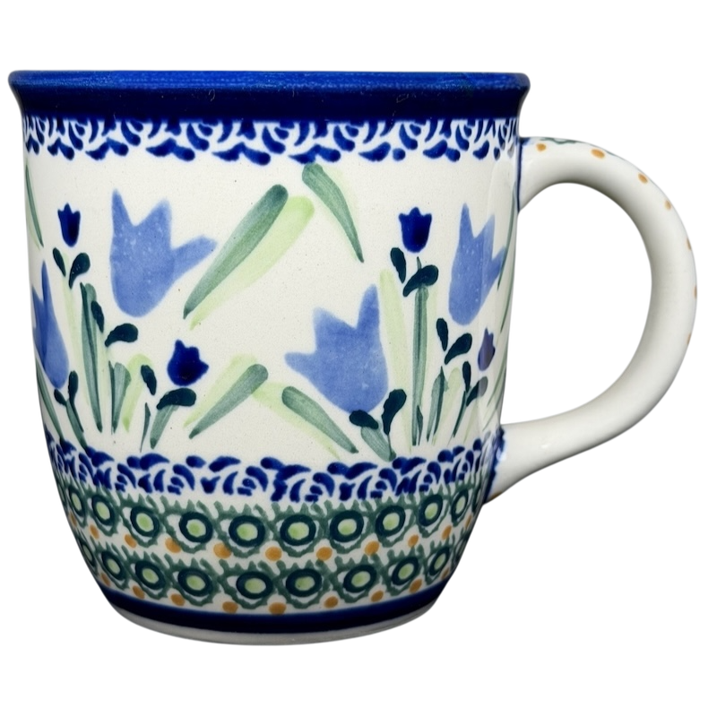 Unikat Boleslawiec blue bell floral mug featuring vibrant floral designs and a decorative border