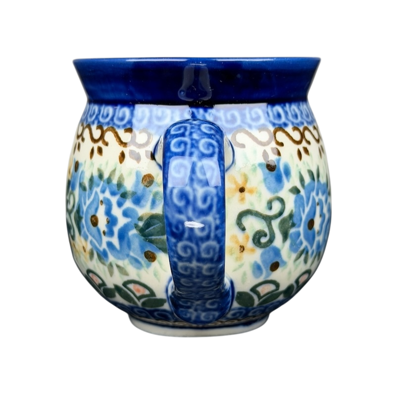 Unikat Boleslawiec Blue Floral mug with intricate floral patterns and a decorative blue handle