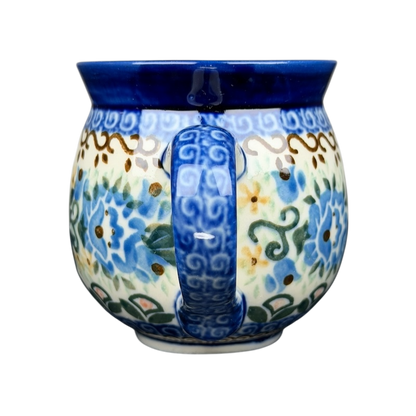 Unikat Boleslawiec Blue Floral mug with intricate floral patterns and a decorative blue handle