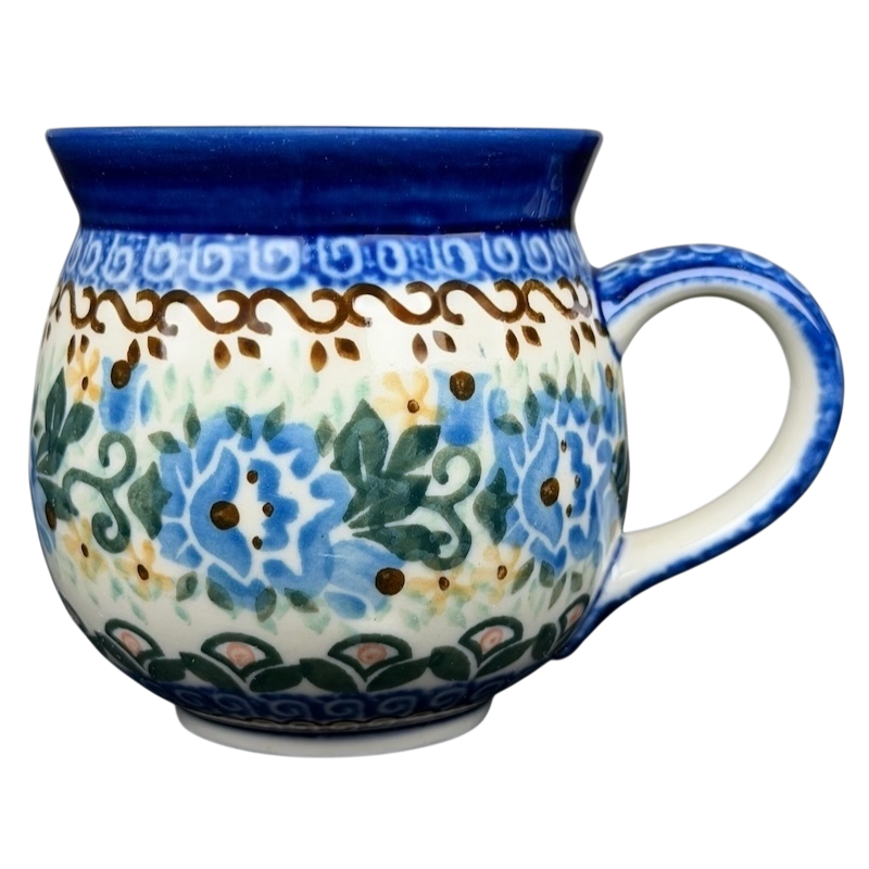 Unikat Boleslawiec Blue Floral mug with intricate floral patterns and a blue rim