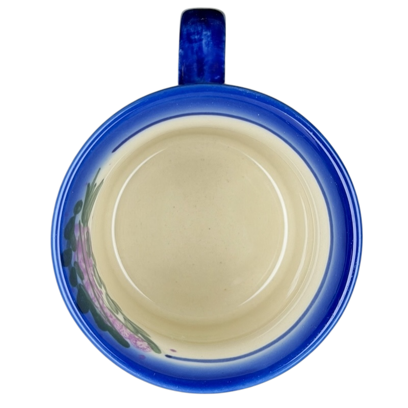 Inside view of Unikat Polish Pottery ANDY Boleslawiec Floral Mug with a blue rim and floral decoration