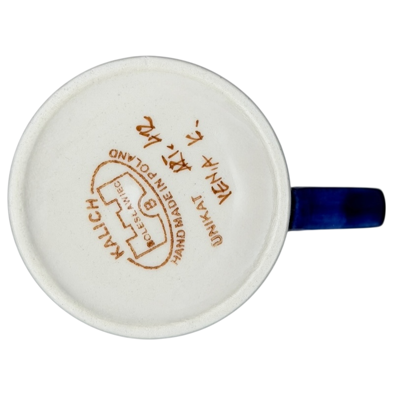 Unikat Polish Pottery Boleslawiec Kalich Floral Mug with intricate floral design and vibrant handle