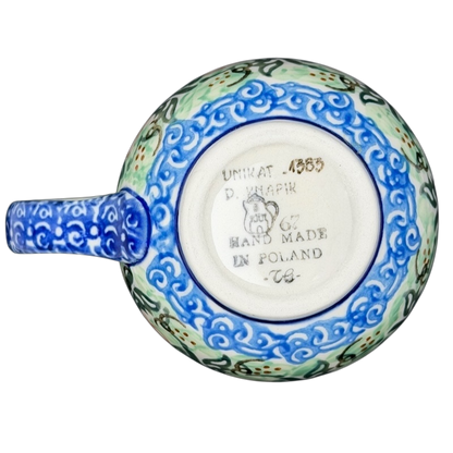 Unikat Polish pottery Boleslawiec mug with intricate blue and green designs and a decorative handle