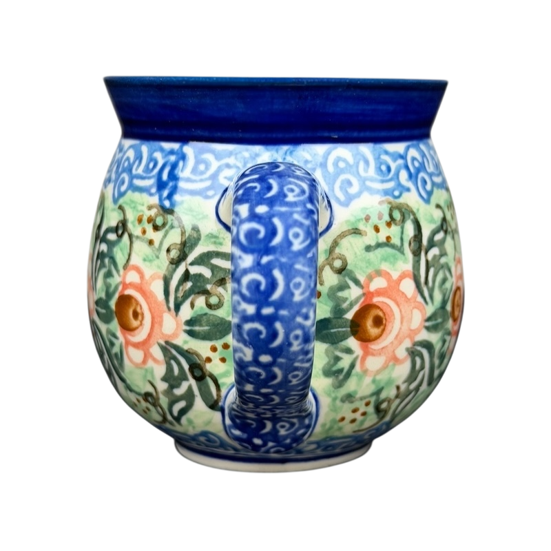Unikat Polish pottery Boleslawiec mug with vibrant floral design and curved handle
