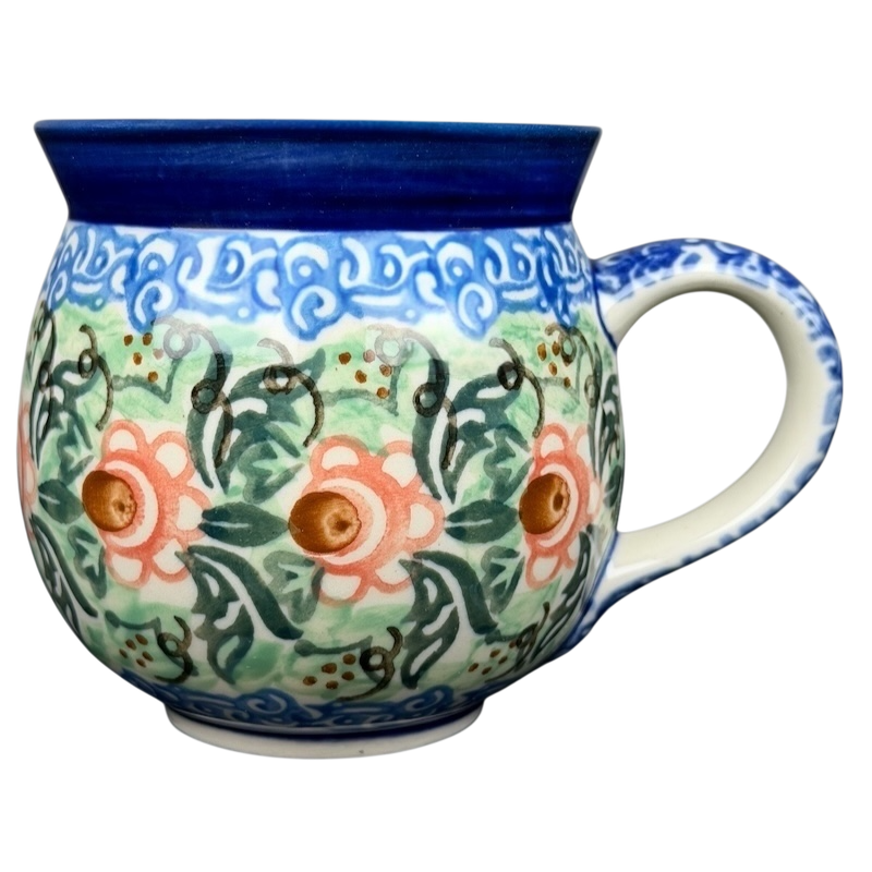 Unikat Polish pottery Boleslawiec mug with floral designs and vibrant colors for coffee or tea