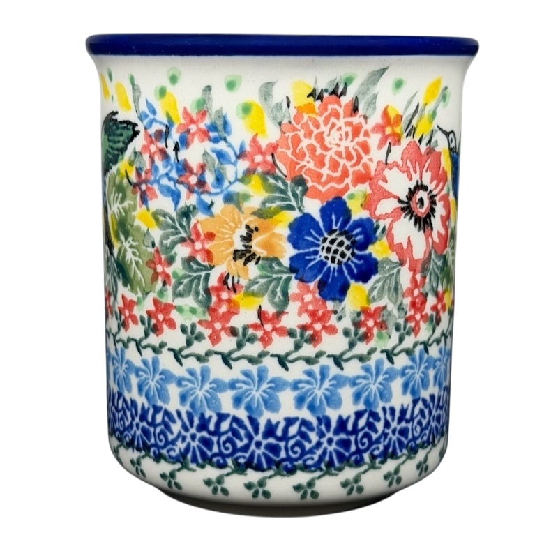 Colorful Unikat Polish pottery hummingbird mug adorned with floral patterns and intricate designs