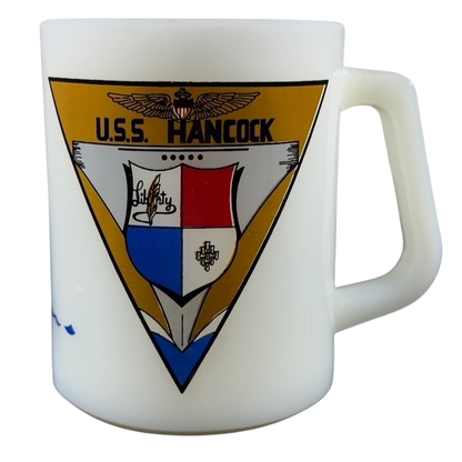 USS Hancock vintage Fire King mug featuring a military insignia design in vibrant colors
