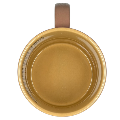 Top view of John Wayne Courage Is Being Scared To Death Mug Vandor in classic yellow with a sturdy handle