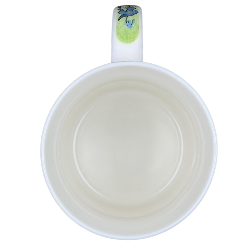 Inside view of the Chaleur Van Gogh Irises collectible mug showing its smooth, white ceramic design