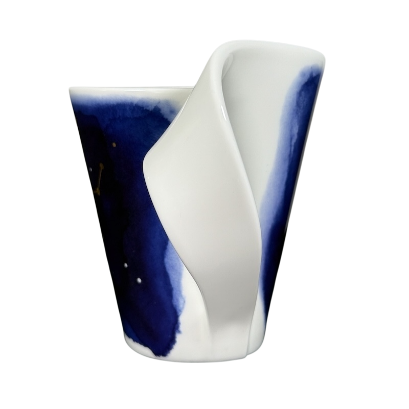 Villeroy and Boch New Wave Stars Sagittarius zodiac coffee mug with sculpted wave handle and blue watercolor design