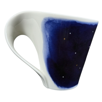 Villeroy and Boch New Wave Stars Sagittarius zodiac coffee mug. White porcelain cup with blue star panel and ergonomic handle