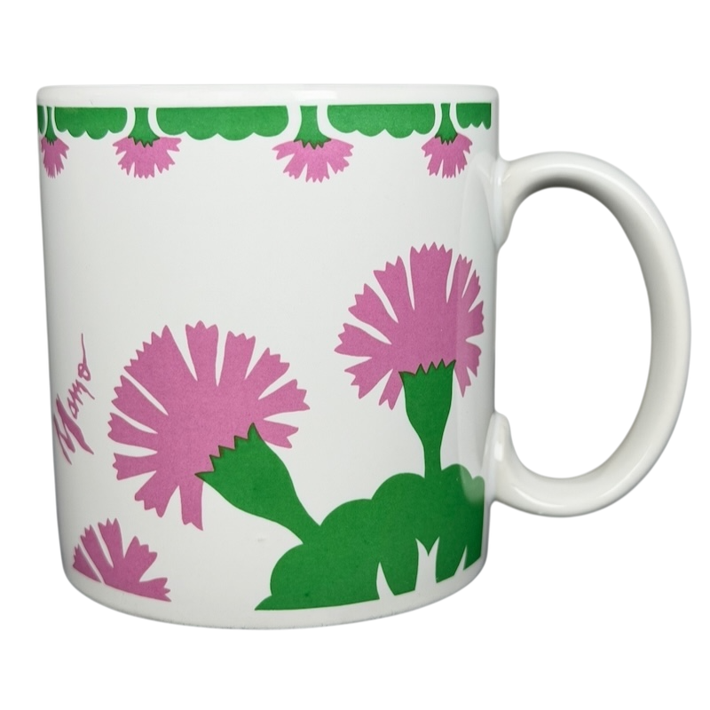 Vintage Aloha Airlines Mamo mug featuring colorful floral designs and a vibrant green trim
