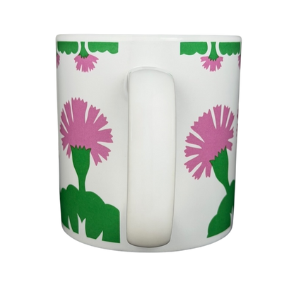 Vintage Aloha Airlines Mamo mug featuring colorful floral design and a sturdy handle