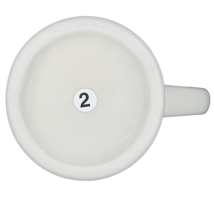 Bottom view of vintage Bad Dog Wisdom Assert Yourself mug showing the number 2 stamped on it