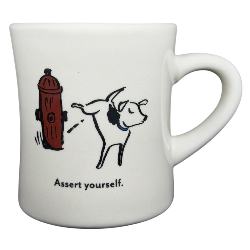 Vintage Bad Dog Wisdom Assert Yourself mug featuring a playful dog and a fire hydrant design
