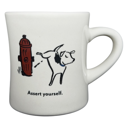 Vintage Bad Dog Wisdom Assert Yourself mug featuring a playful dog and a fire hydrant design