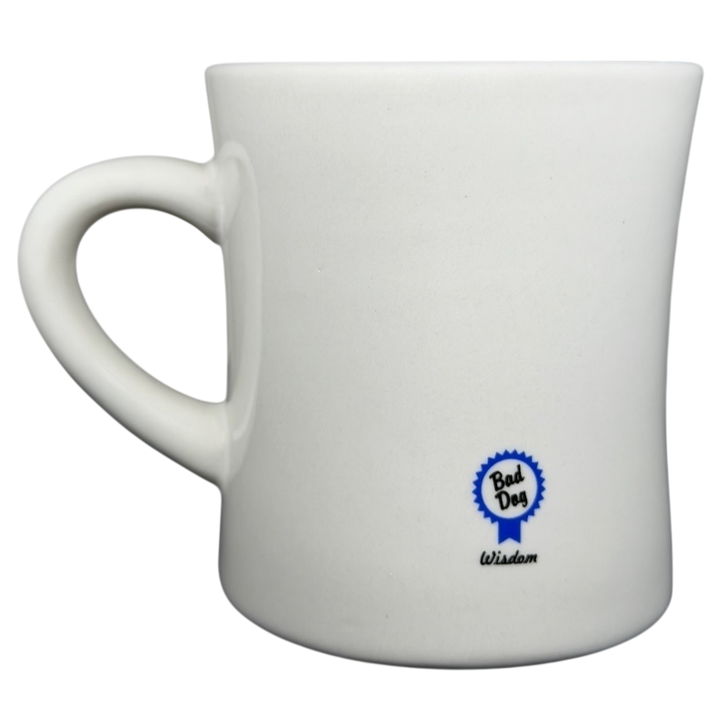 Vintage Bad Dog Wisdom Assert Yourself mug in white ceramic with a blue logo