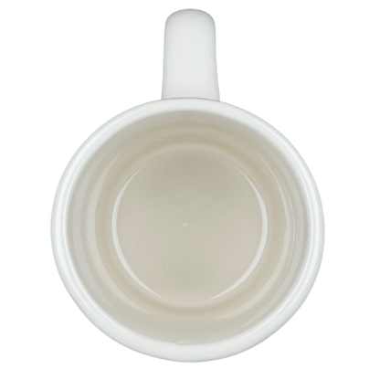 Vintage Bad Dog Wisdom Assert Yourself mug featuring a smooth, white interior design