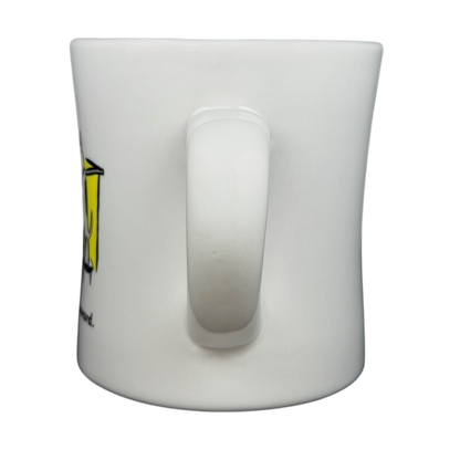 Vintage Bad Dog Wisdom Assess Risk & Reward mug showing a side view with a comfortable handle