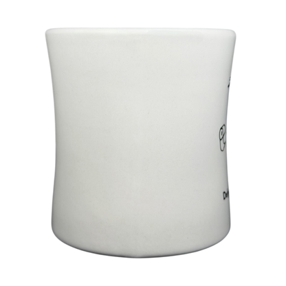 Vintage Bad Dog Wisdom Defy Authority mug with playful dog illustration on white ceramic